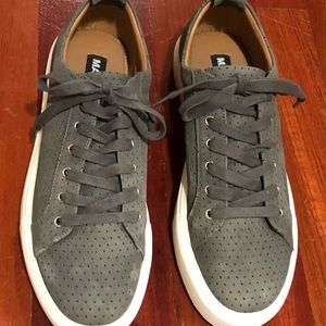 Steve Madden street style comfortable sneakers with a thick, white, rubber sole.